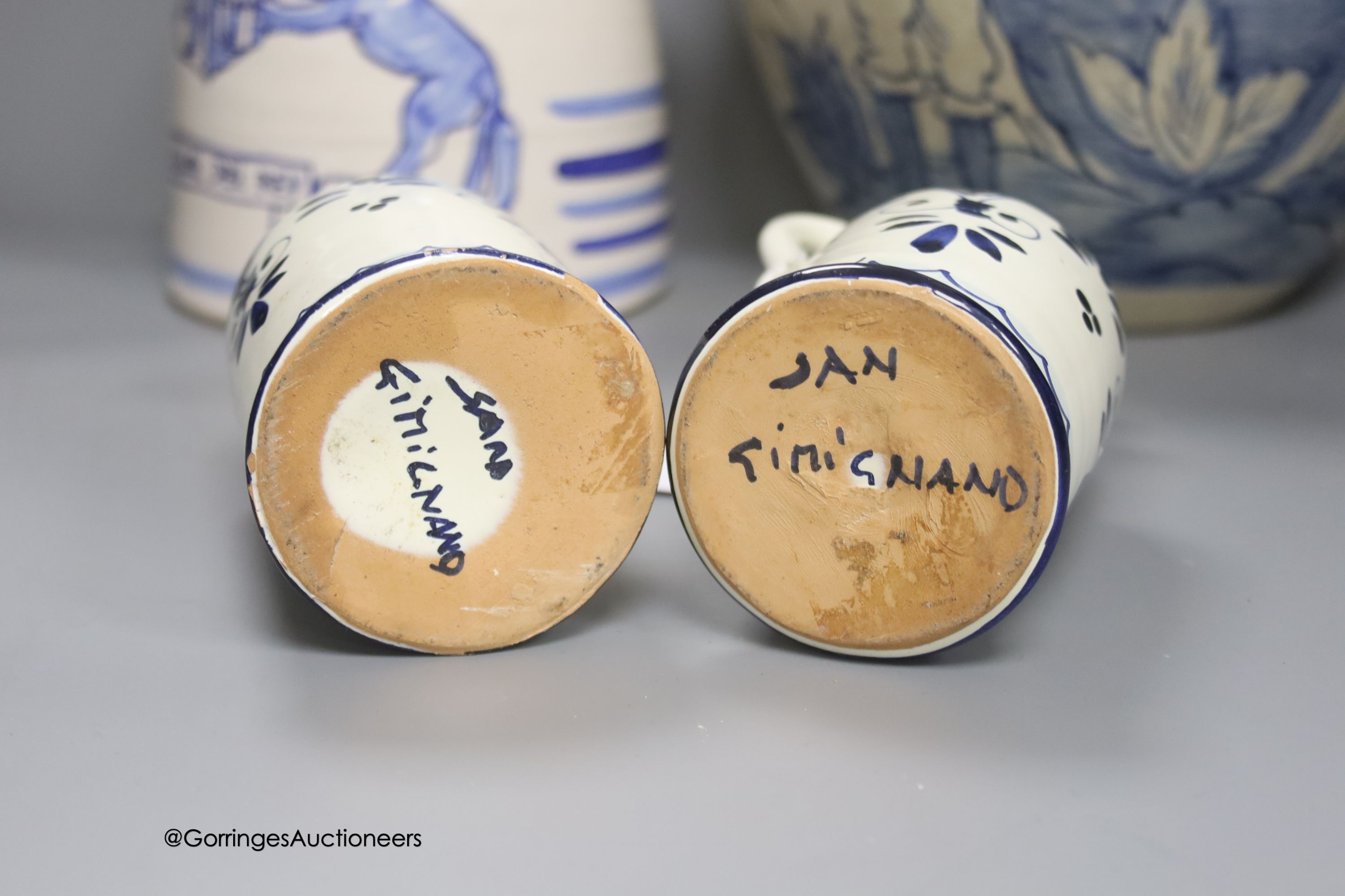 A tin-glazed terracotta barber's bowl dated 1819, a large ovoid eathenware ‘Taback’ jar and three earthenware jugs